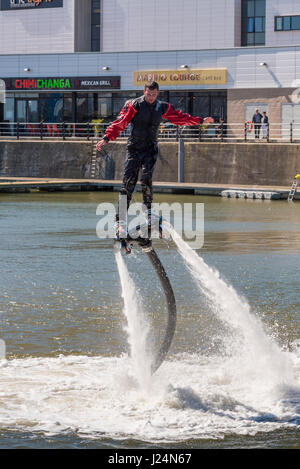 Flying on water jets. Power water jets. Stock Photo