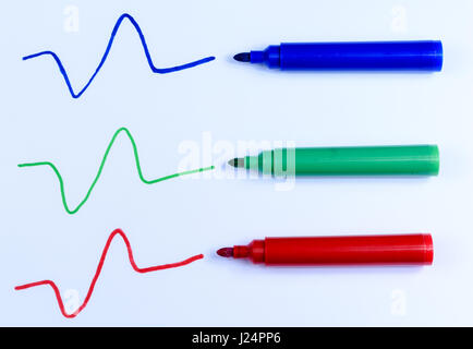 Hand drawn blue, green and red line and pens isolated on a white background Stock Photo