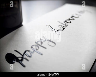 Happy labour's day calligraphy and lattering post card. Left view. Stock Photo