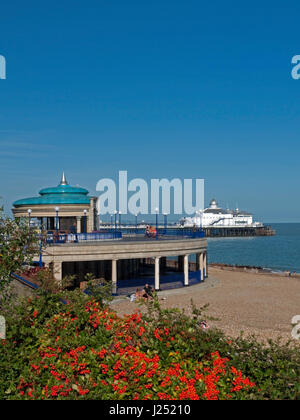 The Colourful Eastbourne Seafront with its iconic Bandstand and Pier, Eastbourne, East Sussex, England, UK Stock Photo