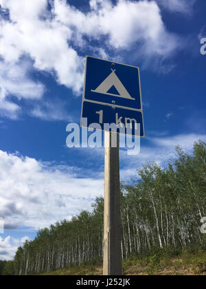 Camping Area One Kilometer Ahead. Stock Photo