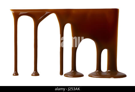 Liquid chocolate flowing down isolated on white background Stock Photo