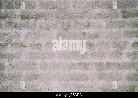 Retro background of a plastered wall with silhouettes of bricks Stock Photo