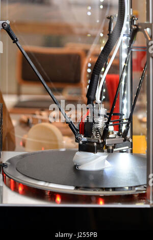 RIGA, LATVIA - MARCH 29, 2017: 3D printer during work process. New printing technology. Stock Photo