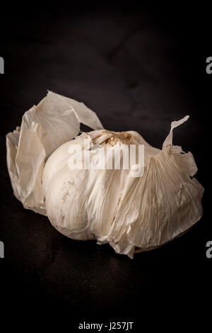 Garlic clove and bulb isolated on white background Stock Photo - Alamy