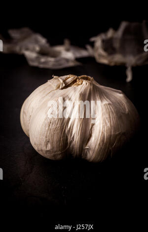 Garlic clove and bulb isolated on white background Stock Photo - Alamy