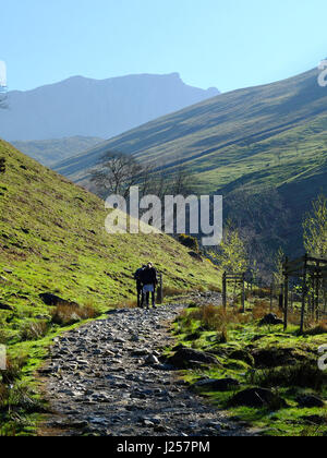 People hiking up to Scafell Pike in the Lade District, Cumbria, England's highest mountain.