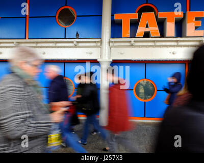 People walking past the Tate Liverpool, in Albert Dock. Stock Photo