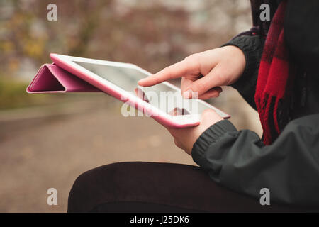 Close up of woman using tablet computer Stock Photo