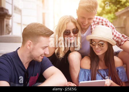 Best friends using digital tablet Stock Photo