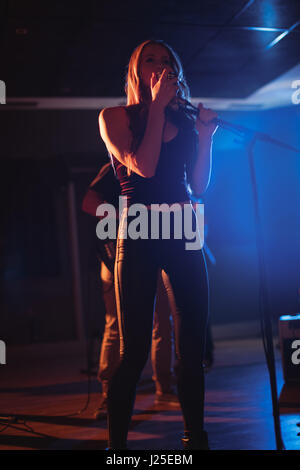 Close-up of male singer singing in recording studio Stock Photo