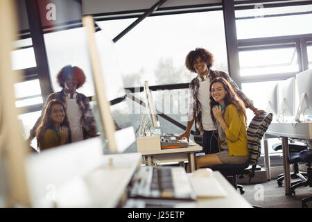 Audio engineers working over computer in recording studio Stock Photo