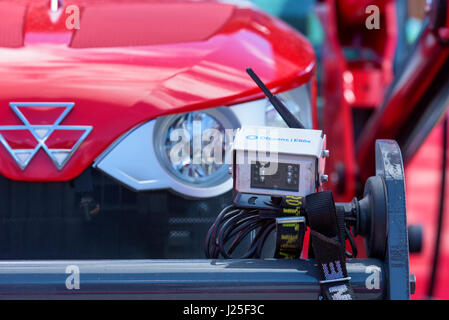 Brakne Hoby, Sweden - April 22, 2017: Documentary of small public farmers day. Remote camera mounted on tractor front. Stock Photo