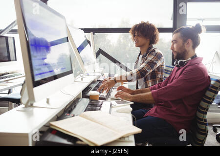 Two sound engineers working together in studio Stock Photo
