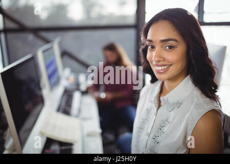 Portrait of beautiful female sound engineer in studio Stock Photo