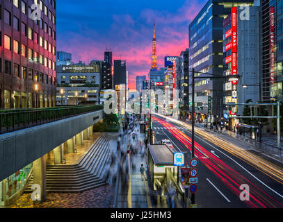 TOKYO, JAPAN - JUNE 9, 2015: Evening Rush Hour near Tokyo Tower, Tokyo, Japan. At 332.9 metres, it is the second-tallest structure in Japan. Stock Photo
