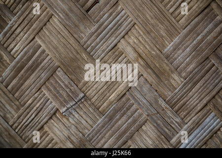 a wall build on wicker bamboo like abstract vintage surface Stock Photo
