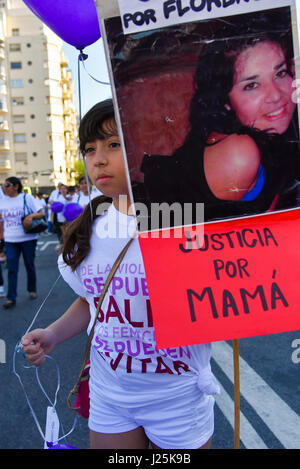 Thousands of women wave banners as they protest violence against women on International Day for the Elimination of Violence against Women in Buenos Aires on November 25, 2016. Stock Photo