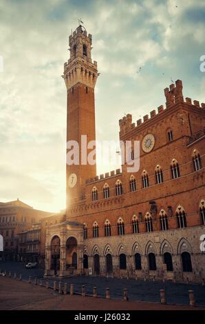 City Hall Bell Tower at Piazza del Campo in Siena Italy. Stock Photo