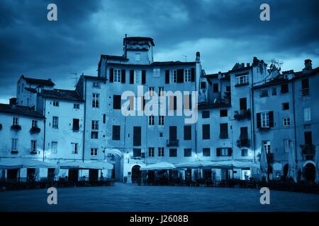 Piazza dell Anfiteatro in Lucca Italy night view Stock Photo