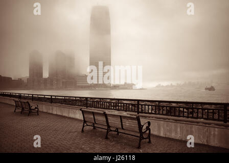 New Jersey and New York City in a foggy day viewed from park Stock Photo