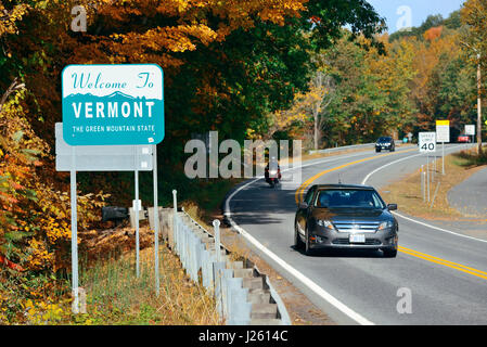 VERMONT - OCT 11: Welcome sign and road traffic on October 11, 2015 in Vermont. Forests cover approximately 75% of its total land area, Vermont is the Stock Photo