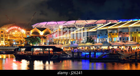 SINGAPORE - APR 5: Clarke Quay at night with street view and restaurant on April 5, 2013 in Singapore. As a historical riverside quay, it is now the h Stock Photo