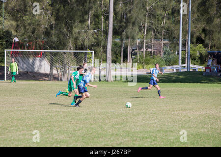 Mens football soccer game being played in Sydney Australia, part of the Manly Warringah football league Stock Photo