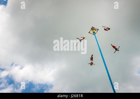 El Tajin, Mexico - May 21, 2014: Man performing the Dance of the Flyers (Danza de Los Voladores) in the El Tajin, Mexico. Stock Photo