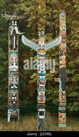 Indian totem poles in Stanley park in Vancouver, Canada. Stock Photo