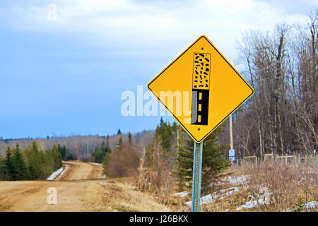 Pavement ends warning sign on a back road. Stock Photo