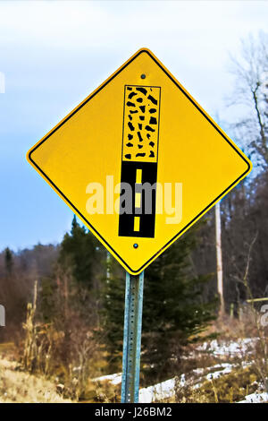 Pavement ends warning sign on a back road. Stock Photo