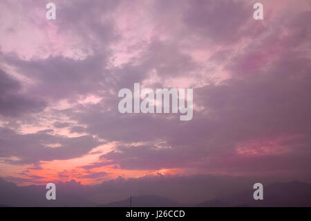 Lots of colour here in this sky over the city of Kathmandu during sunset Stock Photo