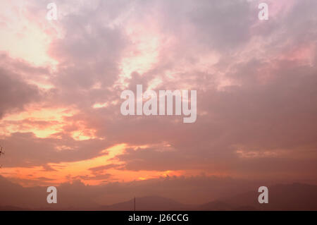 Lots of colour here in this sky over the city of Kathmandu during sunset Stock Photo