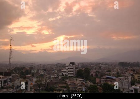 Lots of colour here in this sky over the city of Kathmandu during sunset Stock Photo