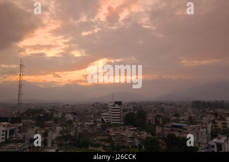 Lots of colour here in this sky over the city of Kathmandu during sunset Stock Photo