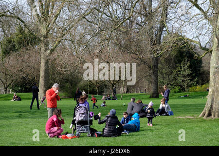 People enjoying the good weather at Hyde Park in London, England, UK, Europe Stock Photo