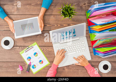 Man and woman working together on business project Stock Photo