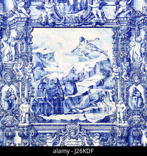 Porto, Portugal - May 13, 2012: Traditional portuguese tilework azulejo on outer wall of the Capela Das Almas De Santa Catarina church in Porto Stock Photo