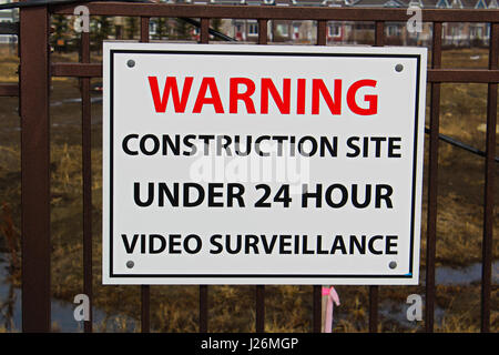 Close up of a construction site surveillance sign. Stock Photo