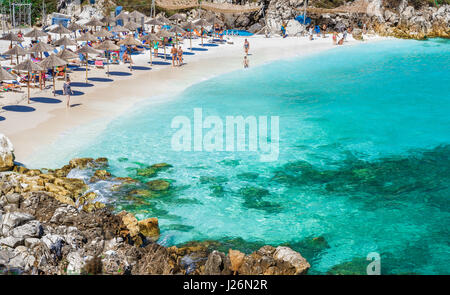 Greece, Thassos - September 21: Beautiful Marble beach also known as Saliara beach, tourists enjoying a nice summer day at the beach in Thassos on Sep Stock Photo