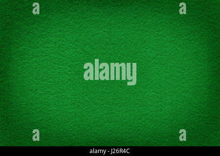Green felt surface with light copy space in center. Texture and background Stock Photo
