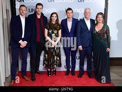 Zygi Kamasa, Michael Epp, Georgie Townsley, Orlando Bloom, Michael Apted and Claudia Bluemhuber attending the Premiere of Unlocked held at The May Fair Hotel, London. PRESS ASSOCIATION Photo. Picture date: Tuesday April 25, 2017. See PA story SHOWBIZ Unlocked. Photo credit should read: Ian West/PA Wire Stock Photo
