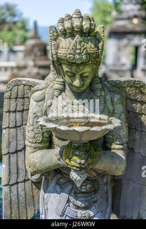 Winged Stone sculpture at Mendut Buddhist Monastery (Vihara Mendut). Located next to Mendut Temple, in Mungkid Town, Central Java Stock Photo