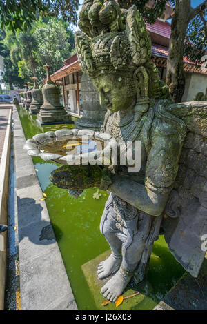 Winged Stone sculpture at Mendut Buddhist Monastery (Vihara Mendut). Located next to Mendut Temple, in Mungkid Town, Central Java Stock Photo