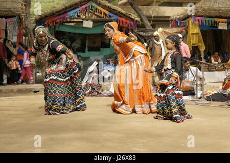 Group of Kalbelia dancers from Rajasthan performing at the Sarujkund Fair near Delhi, India. Stock Photo