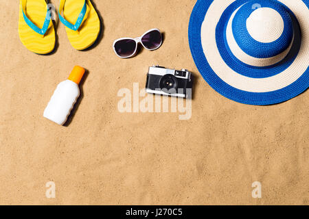 Summer vacation composition. Flip flops, hat and other stuff Stock Photo