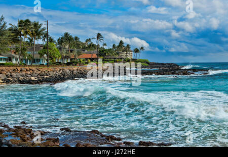 Koloa Kauai Hawaii beautiful beach at Brenneck;s Beach with rocks and waves Stock Photo
