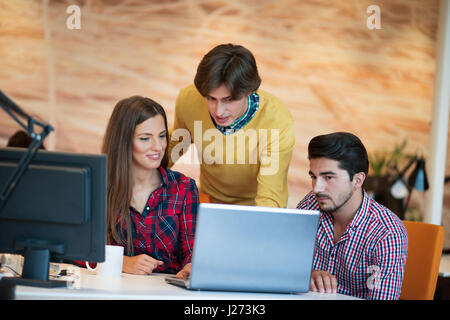 startup business people group working as team to find solution to problem Stock Photo