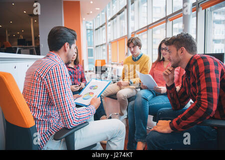 Shot of a group of young business professionals having a meeting. Stock Photo